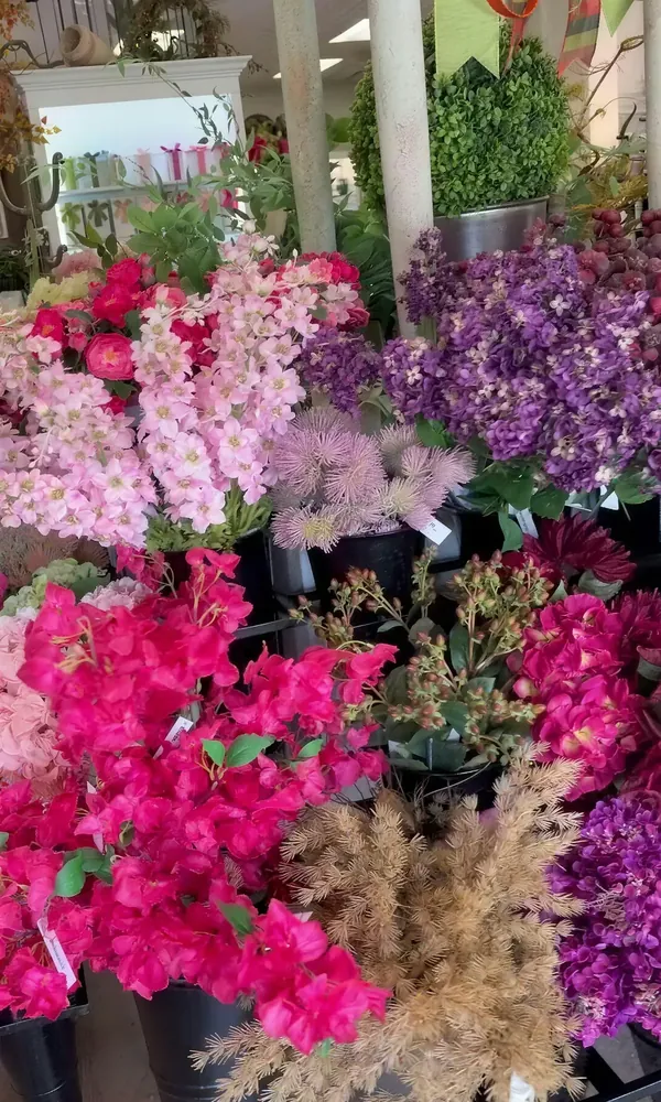 Pink and purple stems in the floral corner